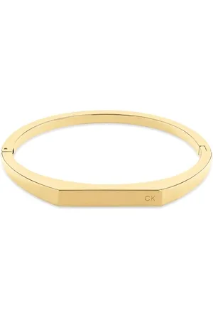 Calvin Klein Damen Armreif ausgelbgoldfarben IP-beschichtetem Edelstahl hergestellt, aus der Faceted Kollektion, Magnetverschluss, Durchmesser 52 x 61 mm, 35000046