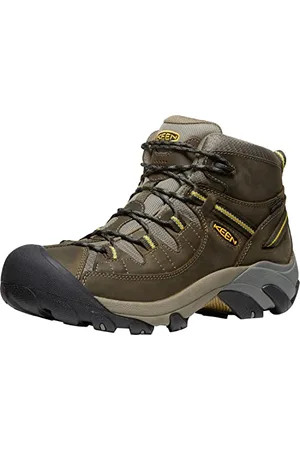 Keen Damskie buty trekkingowe Explore Mid, płaszcz przeciwdeszczowy, wysokie buty turystyczne, rozmiar 42 EU, Czarny oliwkowy żółty, 43 EU