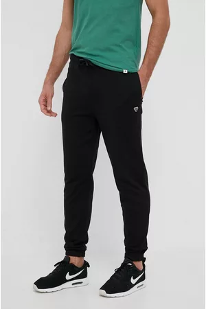 Hummel Mężczyzna Dresowe - Spodnie dresowe bawełniane kolor czarny z aplikacją