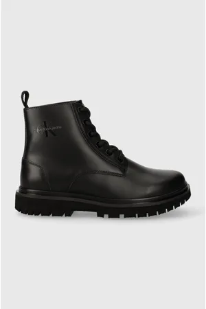 Calvin Klein Botki EVA MID LACE UP BOOT LTH WN damskie kolor na płaskim obcasie YW0YW01263