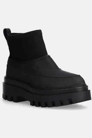 Calvin Klein Botki FLATFORM RAINBOOT LOW MG R damskie kolor na płaskim obcasie YW0YW01560