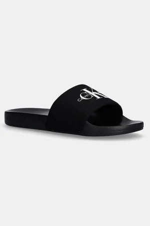Calvin Klein Klapki SLIDE MONOGRAM męskie kolor YM0YM01271