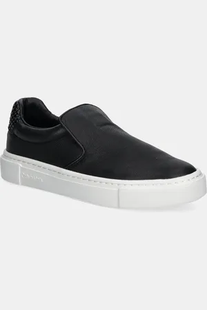 Calvin Klein Tenisówki skórzane CUPSOLE SLIP ON - WOVEN LTH damskie kolor HW0HW02297