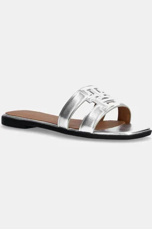 Tommy Hilfiger Klapki skórzane TH LOGO STRAP METALLIC MULE damskie kolor FW0FW08676