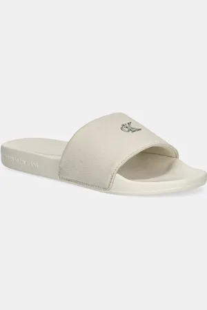 Calvin Klein Klapki SLIDE MONOGRAM HARDWARE damskie kolor YW0YW01713