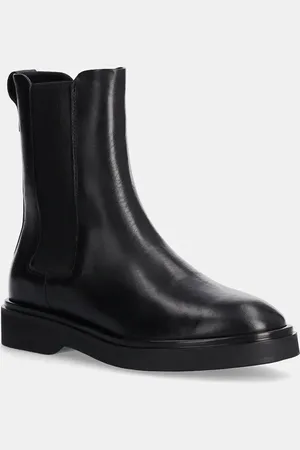Calvin Klein Sztyblety skórzane FLAT CHELSEA BOOT LTH damskie kolor na płaskim obcasie HW0HW02180