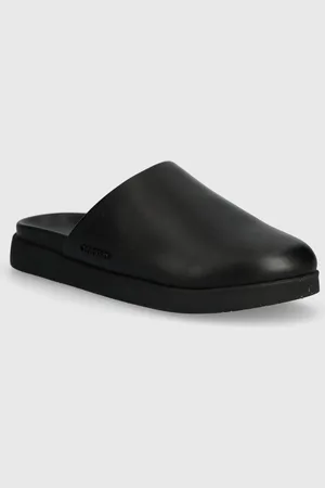 Calvin Klein Klapki skórzane MULE męskie kolor HM0HM01407