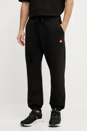 The North Face Spodnie dresowe bawełniane Axys męskie kolor gładkie NF0A8C1UJK31