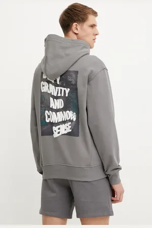 The North Face Bluza bawełniana Heritage Relaxed męska kolor z kapturem z nadrukiem NF0A8C420UZ1