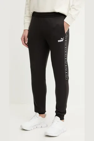 PUMA Spodnie dresowe kolor z aplikacją 684680