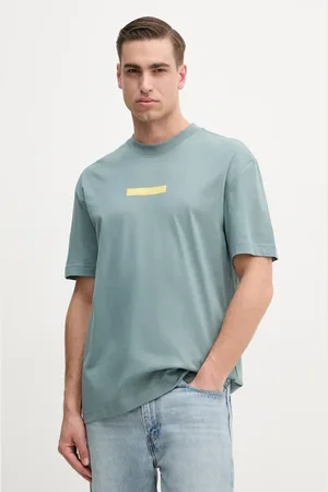 Calvin Klein T-shirt bawełniany męski kolor turkusowy z nadrukiem J30J327524