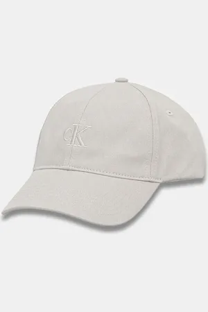 Calvin Klein Czapka z daszkiem bawełniana kolor beżowy z nadrukiem LV04K5024G
