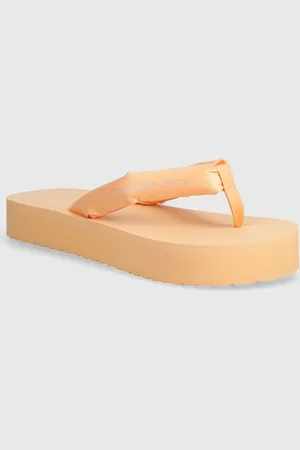 Calvin Klein Japonki BEACH SANDAL FLATFORM PADDED NY damskie kolor na płaskim obcasie YW0YW01400