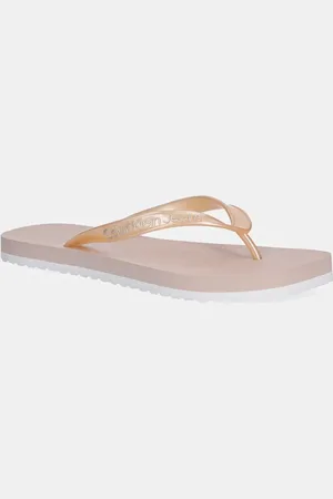 Calvin Klein Japonki THONG+ TPU METALLIC damskie kolor na płaskim obcasie YW0YW01720