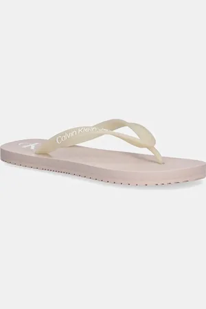 Calvin Klein Japonki BEACH SANDAL TRANSPARENT TPU damskie kolor na płaskim obcasie YW0YW01829