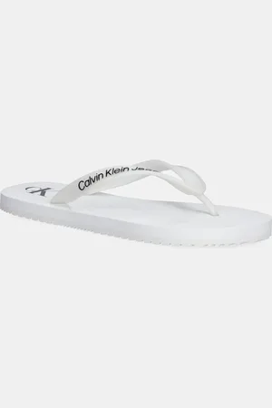 Calvin Klein Japonki BEACH SANDAL TRANSPARENT TPU damskie kolor na płaskim obcasie YW0YW01829