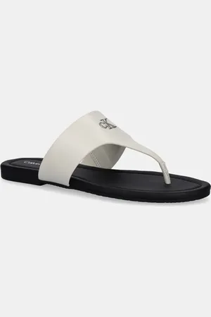 Calvin Klein Japonki FLAT SANDAL TOEPOST MG damskie kolor na płaskim obcasie YW0YW01691