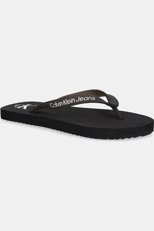 Calvin Klein Japonki BEACH SANDAL TRANSPARENT TPU damskie kolor na płaskim obcasie YW0YW01829