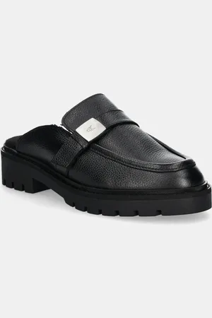 Calvin Klein Klapki skórzane FLATFORM SLIPON MG LTH damskie kolor YW0YW01655