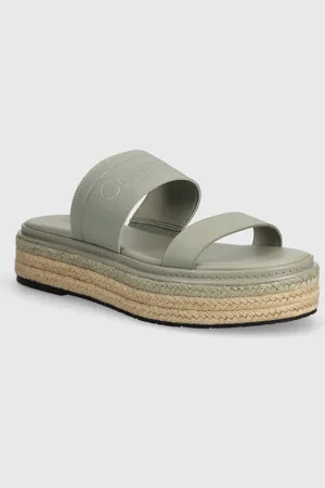 Calvin Klein Klapki WEDGE SLIDE HE damskie kolor na platformie HW0HW01966