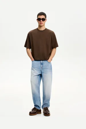 Bershka Jeansy O Kroju Baggy Mężczyzna 32