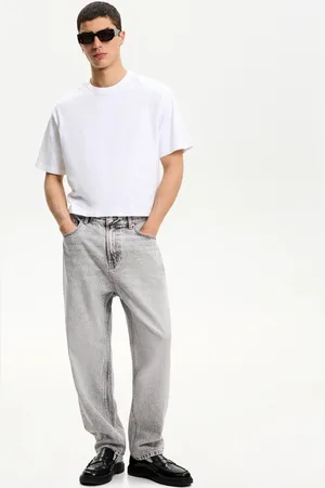 Bershka Jeansy O Kroju Baggy Mężczyzna 32