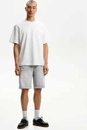 Bershka Jeansowe Bermudy Z Wywiniętymi Nogawkami Mężczyzna 34