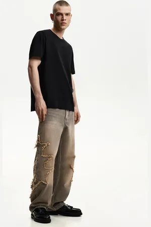 Bershka Jeansy Baggy Z Naszywkami Mężczyzna 32