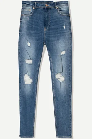 Bershka Jeansy O Kroju Super Skinny Z Efektem Podarcia Mężczyzna 34