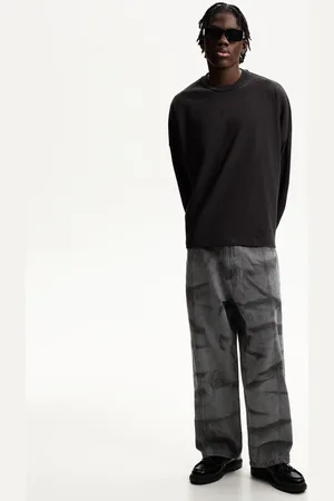 Bershka Spodnie Super Baggy Z Efektem Sprania Mężczyzna 32