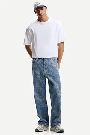 Bershka Jeansy Baggy Z Nadrukiem Mężczyzna 34