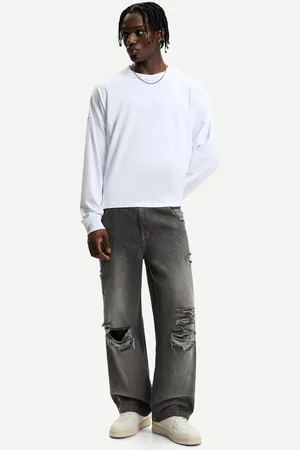 Bershka Jeansy Super Baggy Z Efektem Podarcia Mężczyzna 32