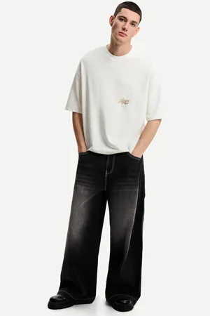 Bershka Jeansy O Kroju Mega Baggy Mężczyzna 32