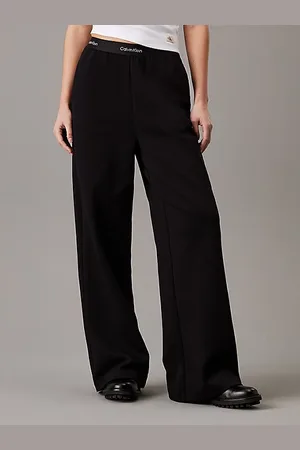 Calvin Klein Spodnie z szerokimi nogawkami i taśmą z logo