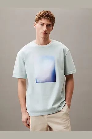Calvin Klein Swobodny T-shirt z opalizującym nadrukiem
