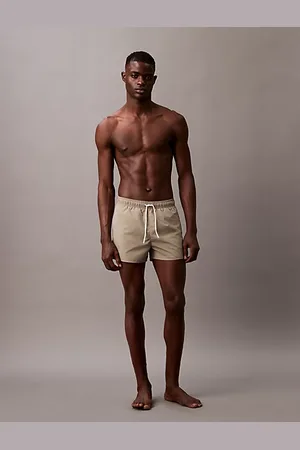 Calvin Klein Szorty kąpielowe o krótkiej długości ściągane sznureczkiem - CK Monogram
