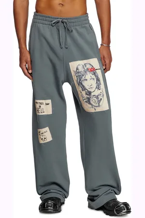 Diesel Track pants with tattoo patches Pants Unisex