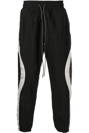 MOSTLY HEARD RARELY SEEN Wave stripe-print track pants