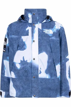Supreme X The North Face bleached denim-print mountain jacket