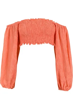 Olympiah Cropped off-shoulder blouse