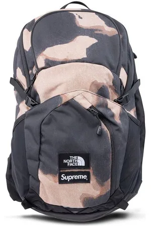 Supreme X The North Face Pocon bleached denim-print backpack