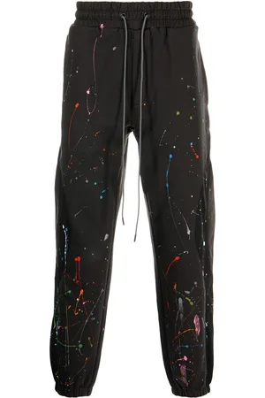 MOSTLY HEARD RARELY SEEN Paint-splattered tapered joggers