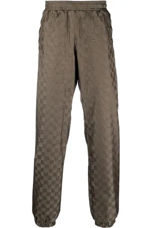MISBHV Monogram-pattern trackpants