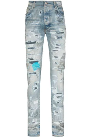 AMIRI Distressed-finish skinny jeans