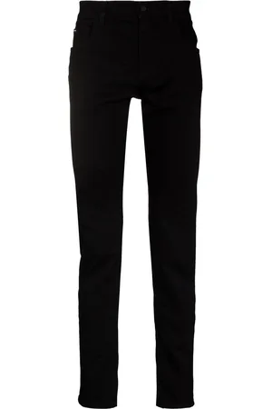 Dolce & Gabbana Logo-patch slim-fit jeans