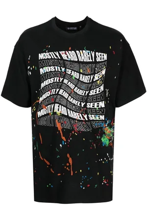 MOSTLY HEARD RARELY SEEN Warped-Logo paint-splatter T-shirt