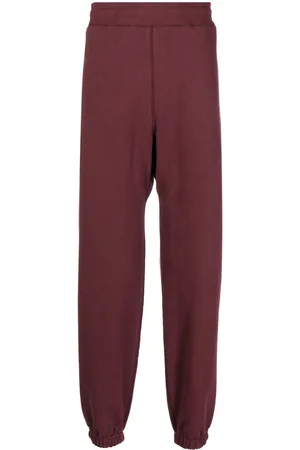 SUICOKE Logo-print cotton track pants