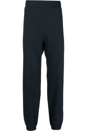 SUICOKE Logo-print cotton track pants