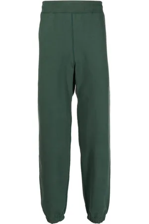 SUICOKE Logo-print cotton track pants