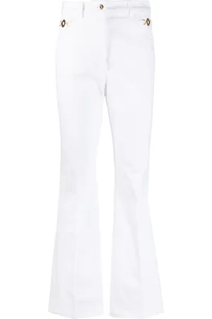 Patou Logo-embroidered flared jeans